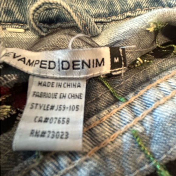 Revamped distressed look jean jacket. Floral lace inert details. - Picture 4 of 5